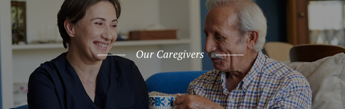 Senior overnight caregivers in uniform, helping elderly patient.